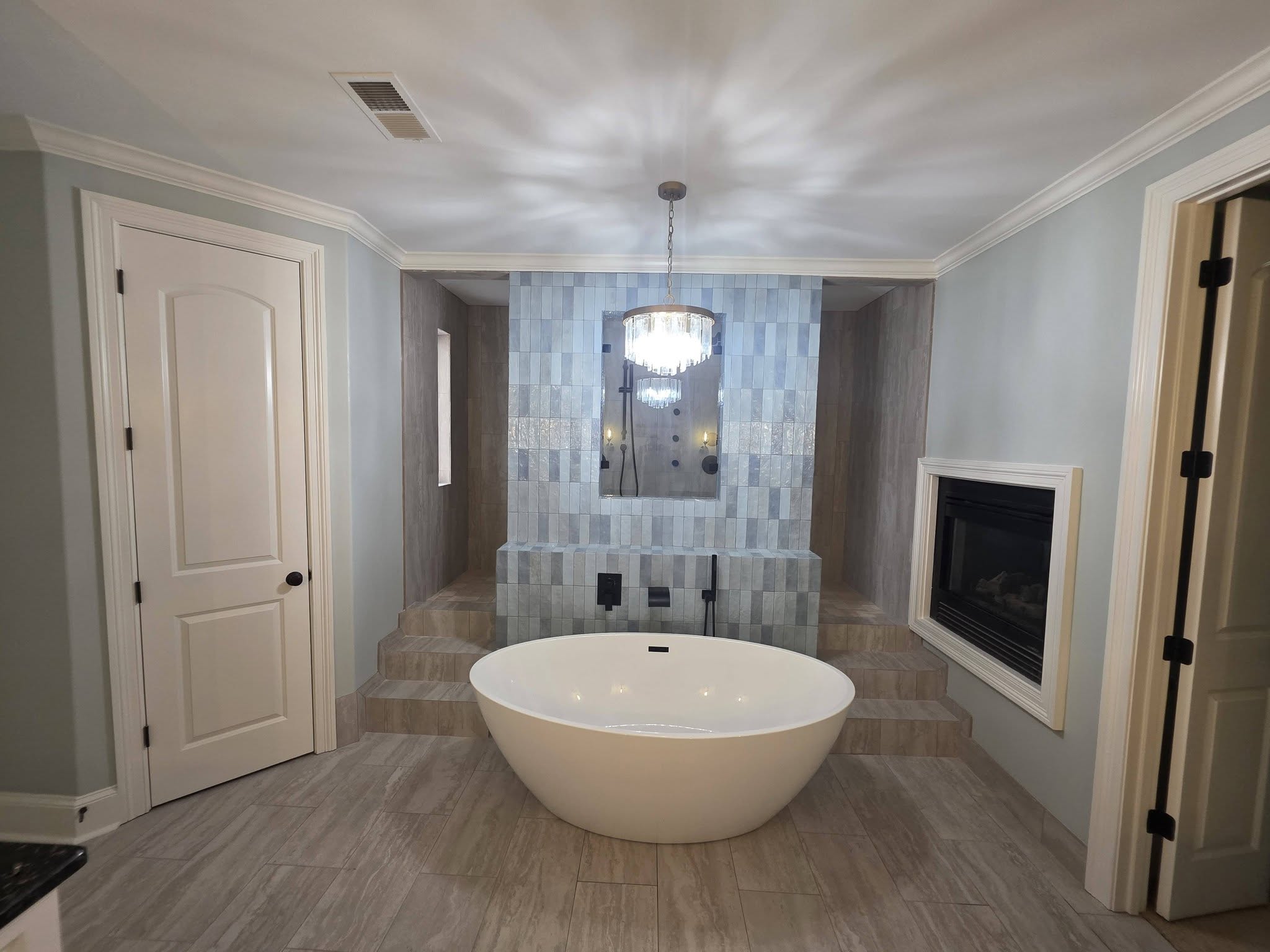Bathroom renovation with custom tile and soaking tub