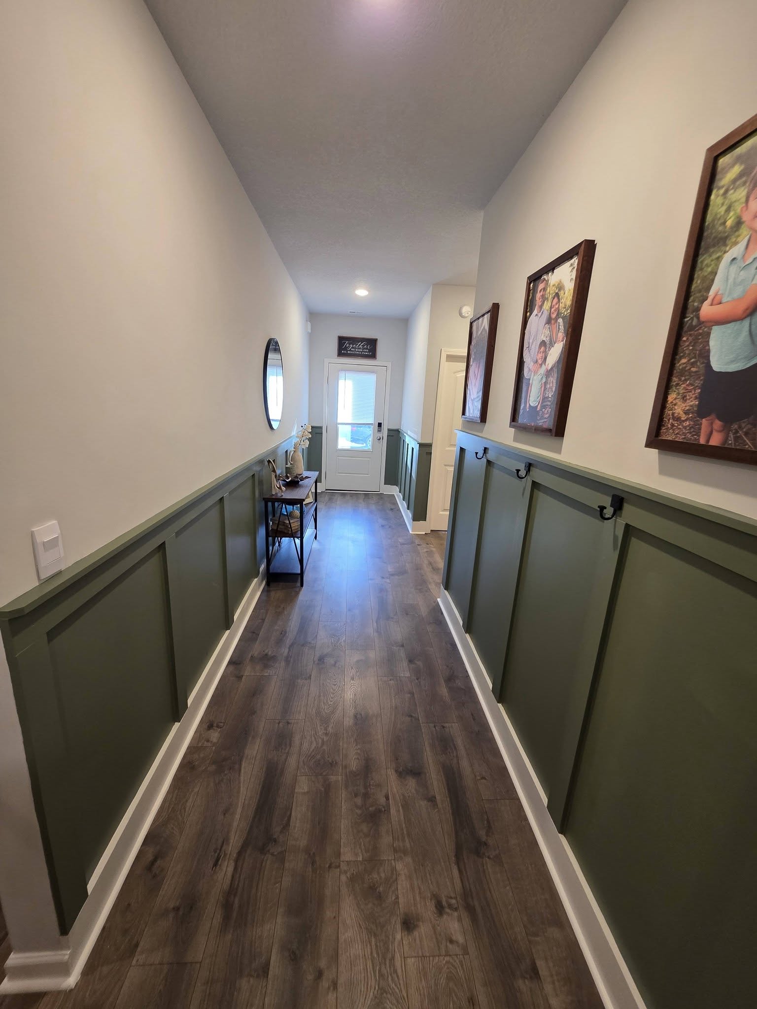 Hallway renovation with paint and flooring updates